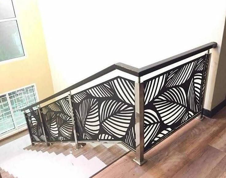 Custom geometric iron staircase and handrail